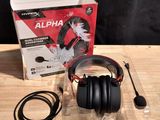 an image of a pair of headphones sitting on top of a wooden table