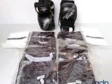 four pairs of boxing gloves and a pair of gloves
