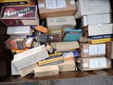 a pile of boxes that are sitting in the back of a truck