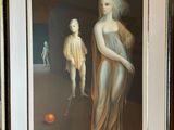 tableau représentant une femme et un enfant debout devant une orange