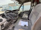 a dirty car with a steering wheel and a dashboard
