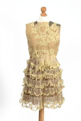an image of a dress on a mannequin on a white background