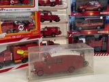 a lot of toy fire trucks on display in a store