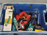 a blue box with tools in it on a table
