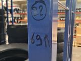 a close up of a tire on a pallet in a warehouse