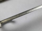 a close up of a pair of scissors on a table