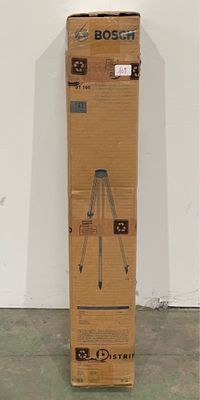 a cardboard box with a tripod on top of it