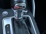 a close up of a gear stick in a car