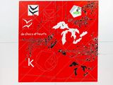 a red poster with a picture of a map on it