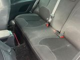 two seats in the back of a car that are empty
