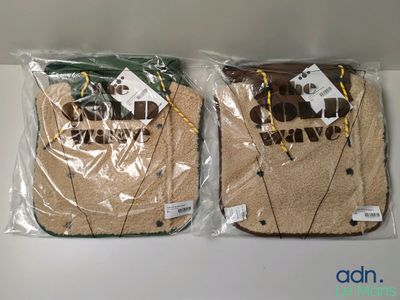 two bags of food that are sitting on a table