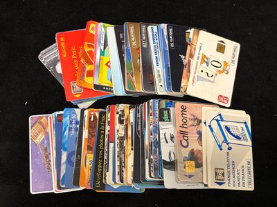 many credit cards sitting next to each other on a table