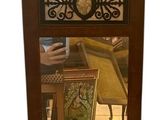 a person taking a picture of themselves in a mirror