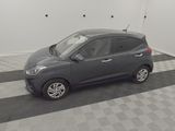 a picture of a small car parked in a garage