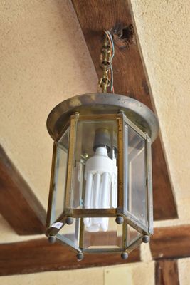a light that is hanging from the ceiling in the room