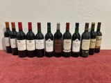a group of bottles of wine sitting on top of a table