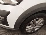 a close up view of a car ' s front tire