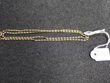a close up of a chain with a tag attached to it
