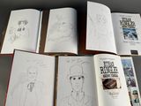 a book with a bunch of drawings on it