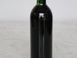 a bottle of wine that is sitting on a table