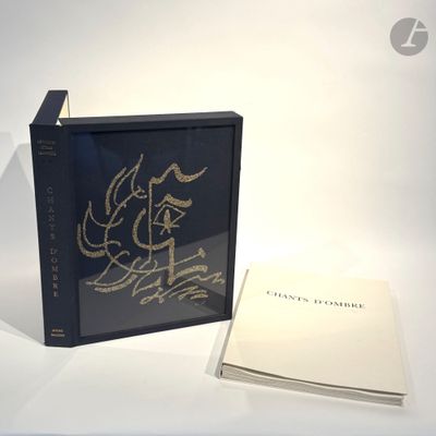 a book that is sitting on a table next to a book