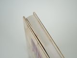 a close up picture of a book on a table