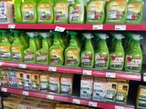 many bottles of cleaning products on the shelves in the store