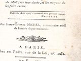 un vieux livre avec un oiseau sur la couverture