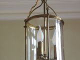 a light that is hanging from the ceiling in the room