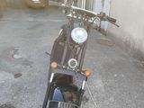 a motorcycle that is parked in a garage