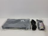 an image of a box with two cables and a remote control in it