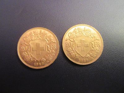 deux pièces d'or sur lesquelles figure un blason