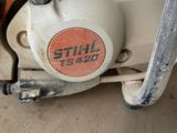 a close up of a motor bike with a sticker on it