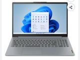 un gros plan d'un ordinateur portable sur fond blanc avec un fond bleu