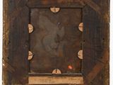 an old picture frame with a piece of wood in the middle