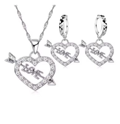 Parure cœur, pendentif et paire de boucle d'oreille zircon b…