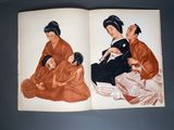 an open book with two pictures of a woman and a child