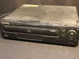 a picture of a cd player sitting on top of a table