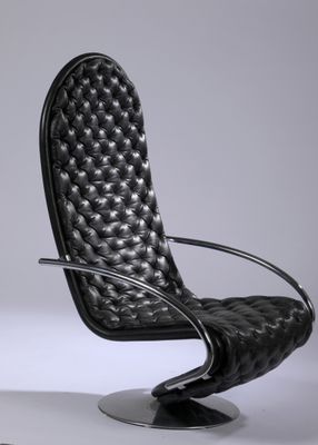 an image of a black leather chair with a chrome base