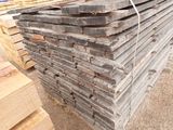 many pieces of wood stacked on top of each other