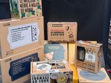 several boxes of food are stacked on top of each other on a table
