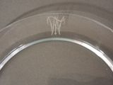 a glass plate with a picture of a horse on it