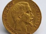 l'image d'une pièce d'or sur laquelle figure le visage d'un homme