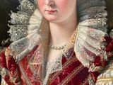 portrait of a woman in a red and white dress with a white lace collar