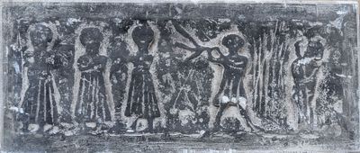 a black and white photo of a group of people on a wall