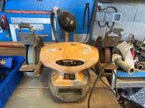 a machine that is sitting on a table in a workshop