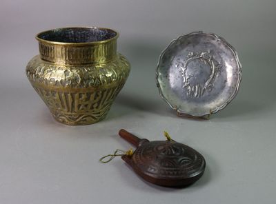 two vases sitting next to each other on a table