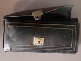 a small black box with a lock on top of it