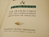 an open book with a picture of a bird on it