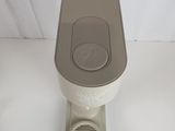 a toilet that is sitting on a white surface